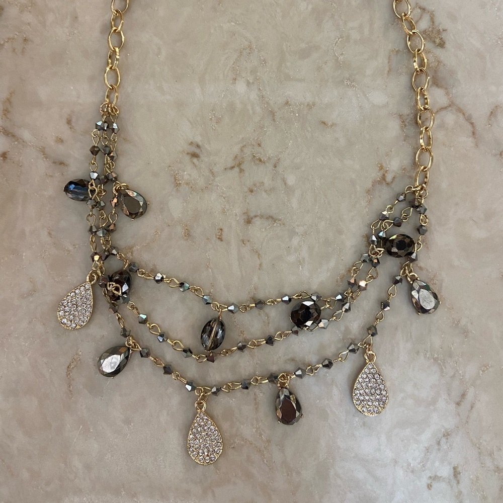 Gold and black and silver layered necklace